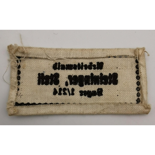 315 - A personalised, WWII German uniform label.