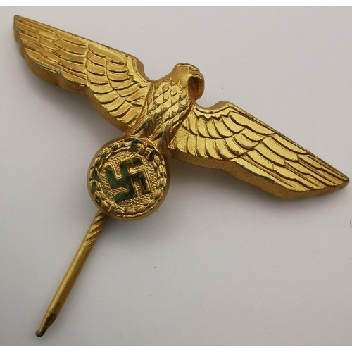 316 - A WWII German Kriegsmarine Officer's cap wreath/cockade & Eagle pin.