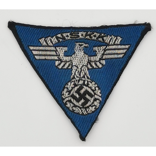 321 - A WWII German NSKK Overseas cap patch,  an Anti-Aircraft Air Defence badge (no badge bar) & an army ... 