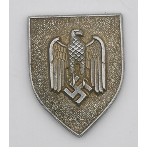 321 - A WWII German NSKK Overseas cap patch,  an Anti-Aircraft Air Defence badge (no badge bar) & an army ... 