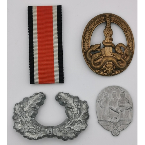 322 - A WWII German Iron Cross ribbon, Fundraising 'Tinnie' token, Anti-Partisan SS badge (reproduction) &... 