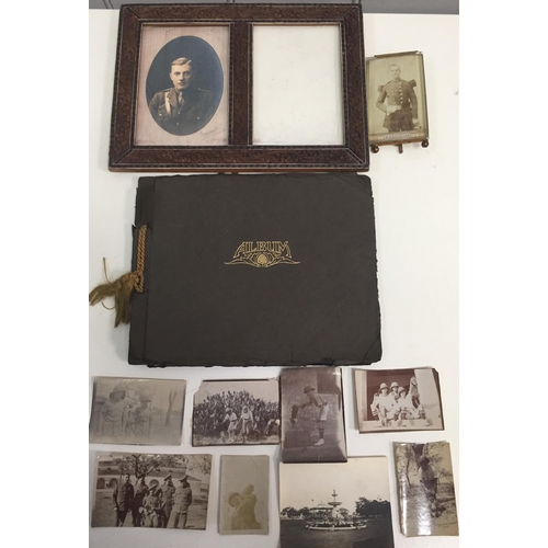 362 - A small collection of WWI wartime & family photographs, with frame & album.