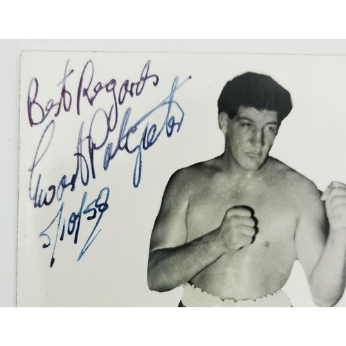 450 - A signed postcard of the boxer, Ewart Potgieter - 'Pottie' (South Africa 1932-1997). Pottie was a 7'... 