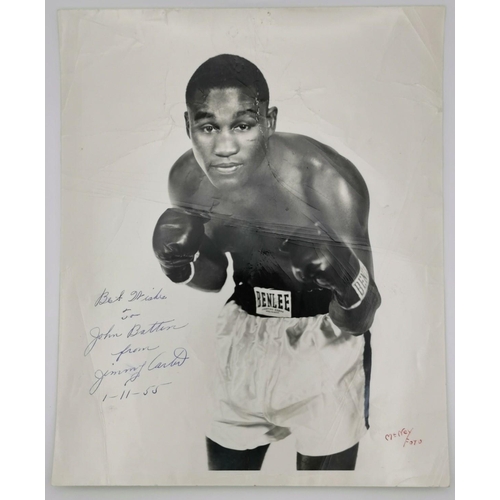 454 - A signed/dedicated photo, with original envelope, of the boxer, James 'Jimmy' Carter (USA 1923-1994)... 