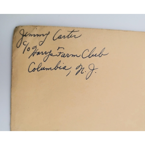 454 - A signed/dedicated photo, with original envelope, of the boxer, James 'Jimmy' Carter (USA 1923-1994)... 