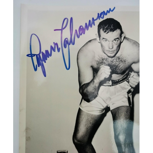 457 - A signed photo, with certificate of authenticity, of the boxer, Ingemar Johansson (Sweden 1932-2009)... 