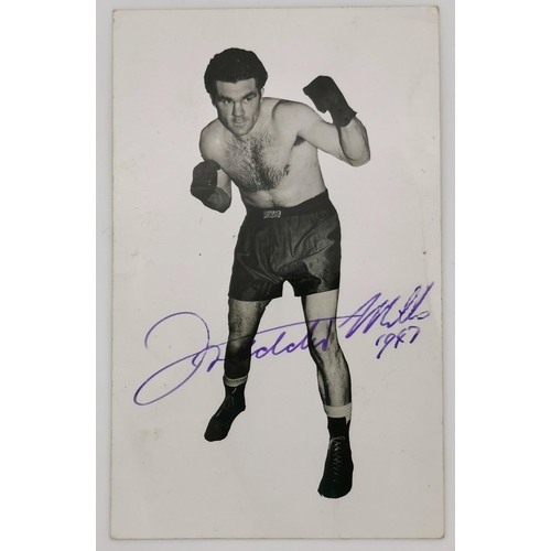 A signed photo of the boxer, Freddie Mills (British 1919-1965). Freddie Mills fought at several weights, & was a professional World Light Heavyweight Champion boxer, active between 1936 & 1950, taking part in 101 professional contests. On 24 July 1965, Mills was found dead in his car. A fairground rifle was in the car with Mills, who had been shot through his right eye. The question of suicide or murder remains a mystery.