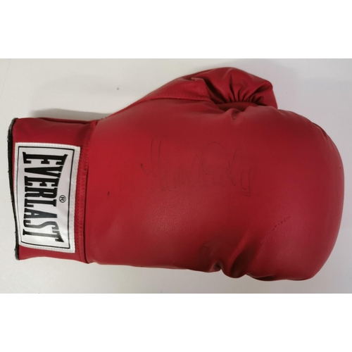 471 - An Everlast boxing glove, with certificate of authenticity, signed by Henry Cooper (British 1934-201... 