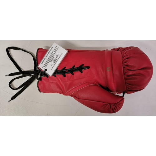 471 - An Everlast boxing glove, with certificate of authenticity, signed by Henry Cooper (British 1934-201... 