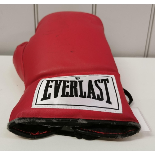 471 - An Everlast boxing glove, with certificate of authenticity, signed by Henry Cooper (British 1934-201... 