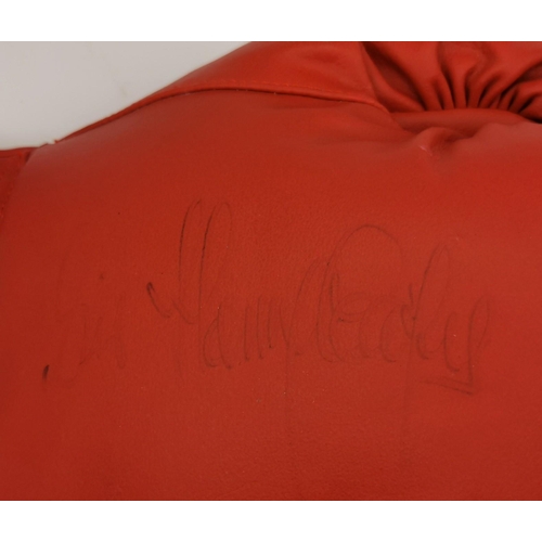 471 - An Everlast boxing glove, with certificate of authenticity, signed by Henry Cooper (British 1934-201... 