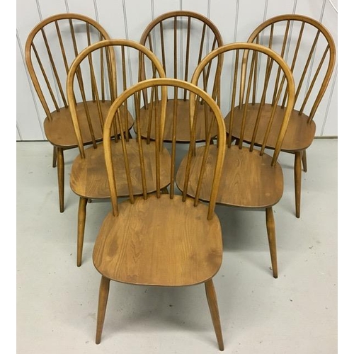 97 - A set of six, dark elm Ercol Windsor chairs. Dimensions(cm) H90(42 to seat), W45, D55.