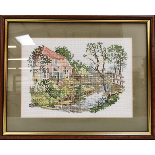 1 - A vintage glazed, cross-stitch fire screen, together with a framed country-scene cross-stitch. Respe... 