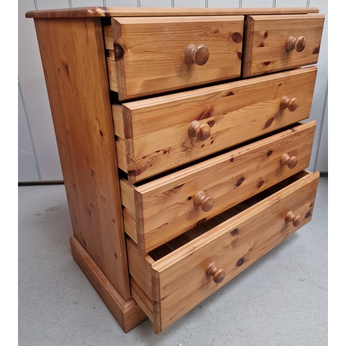 27 - A two over three solid pine chest of drawers. Dimensions(cm) H89, W82, D44.