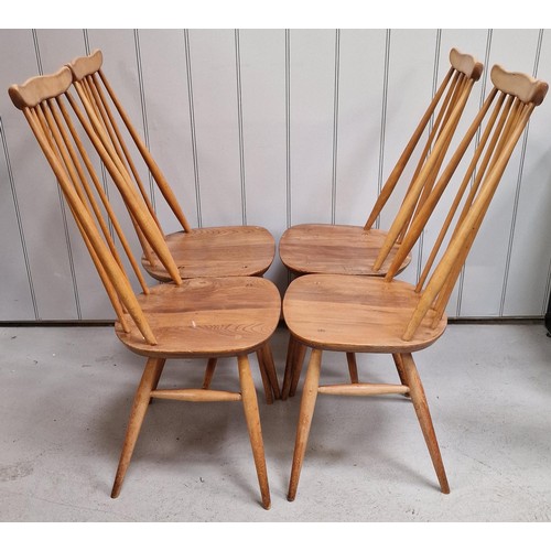 94 - A set of four Ercol Blonde Goldsmith high-backed chairs. Dimensions(cm) H100(42 to seat), W42, D50.