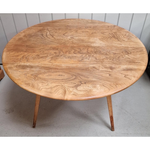 95 - An Ercol Blonde drop-leaf dining table. Dimensions(cm) H72, W113, D66/126.