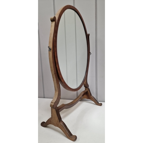 106 - An antique, mahogany swing-top dressing table mirror. Dimensions(cm) H59, W39, D21.