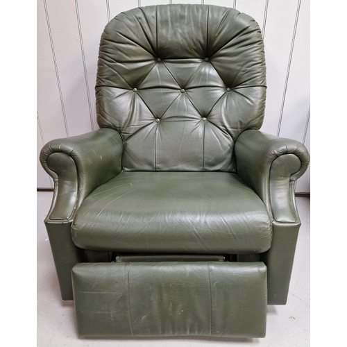 113 - A green leather, manual reclining 'La-Z-Boy' armchair. Dimensions(cm) H103(40 to seat), W84, D50/90.