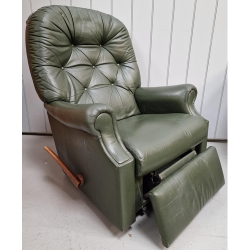 113 - A green leather, manual reclining 'La-Z-Boy' armchair. Dimensions(cm) H103(40 to seat), W84, D50/90.