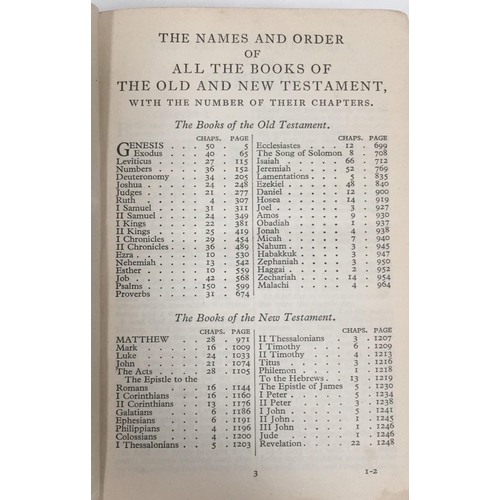 140 - A vintage Bible, bound with a wooden front page. Dimensions (cm) H14, W10, D4.