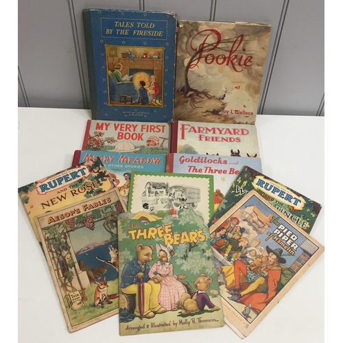 144 - A collection of twelve vintage children's books. Hardback titles to include 'Tales Told By The Fires... 