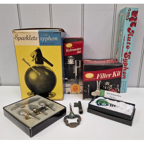 259 - A selection of vintage beer/wine making accessories, together with boxed bottle-stoppers, corkscrew ... 