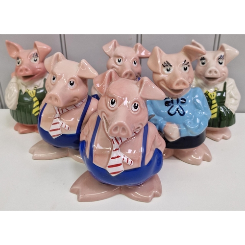 A collection of six NatWest piggy banks, by 'Wade'. Tallest 18cm.