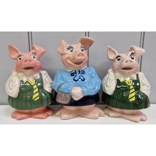 A collection of six NatWest piggy banks, by 'Wade'. Tallest 18cm.