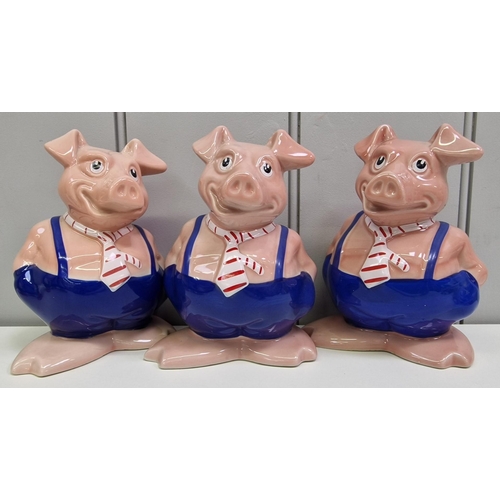 A collection of six NatWest piggy banks, by 'Wade'. Tallest 18cm.