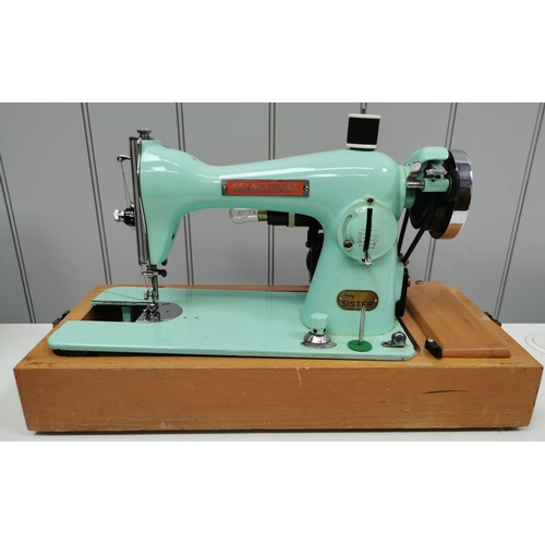 828 - A 1970s, turquoise-green, electric 