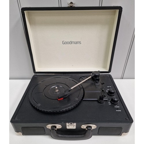 829 - A Goodmans portable, bluetooth turntable. Model no.347753. No mains adaptor present. Untested.