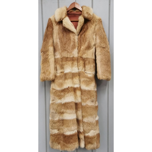 836 - A vintage, long, fox fur coat.