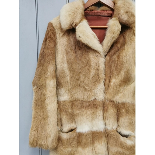 836 - A vintage, long, fox fur coat.