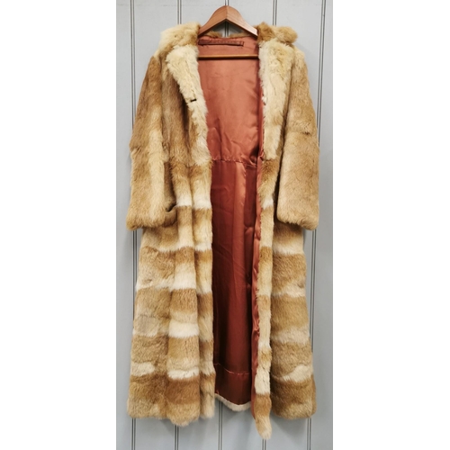 836 - A vintage, long, fox fur coat.