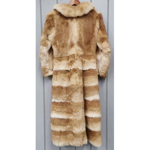 836 - A vintage, long, fox fur coat.