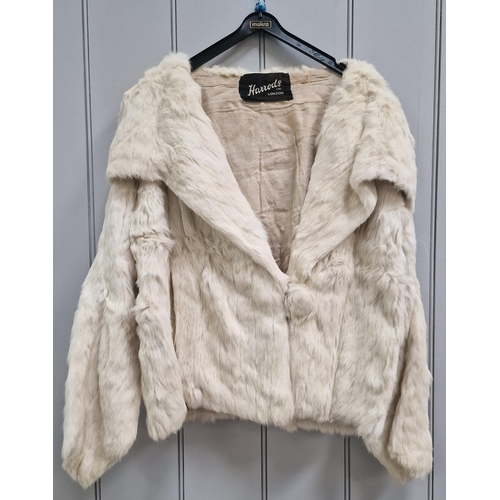 837 - A vintage, cream coloured fur jacket, originally from Harrods.