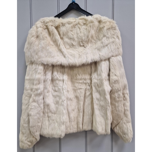 837 - A vintage, cream coloured fur jacket, originally from Harrods.