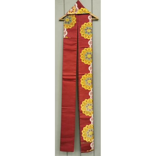 850 - A mid-century, hand-embroidered Japanese silk Obi Sash, in red, with a white, yellow, blue & gold fl... 