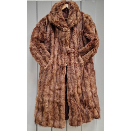 851 - A vintage full length fur coat, with accessorized fur cuffs & neck warmer.