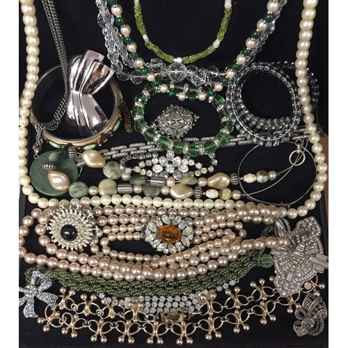 854 - A selection of costume jewellery. To include synthetic pearl necklaces, other necklaces & bracelets.