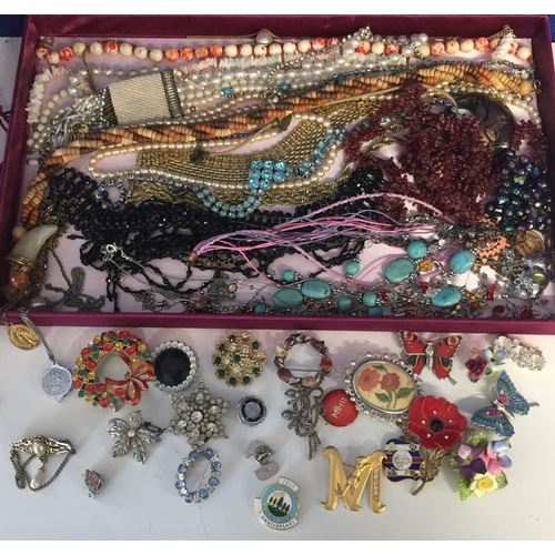 853 - A large collection of costume jewellery. To include necklaces (20+), earrings/brooches/pins (20+), e... 