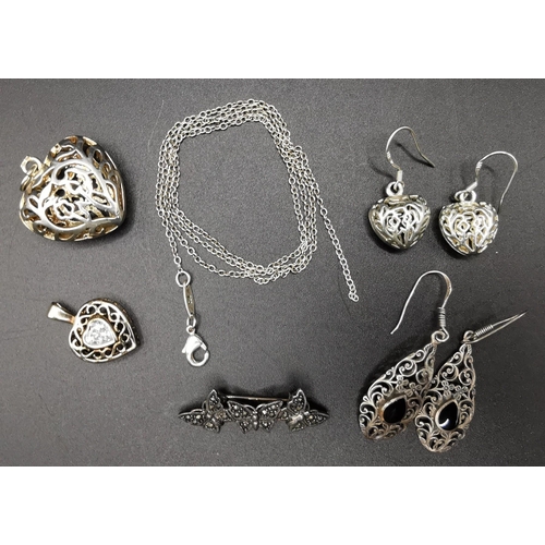 870 - Two pairs of silver earrings, silver brooch, silver chain (broken) a silver heart locket & another w... 