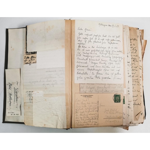 152 - An extensive scrapbook holding many letters, postcards & photo's mostly from a German soldier to his... 