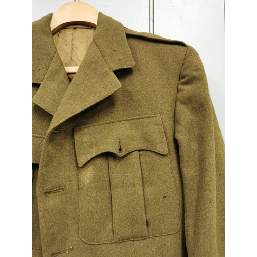 155 - A British WWII Tunic. No buttons/badges present.