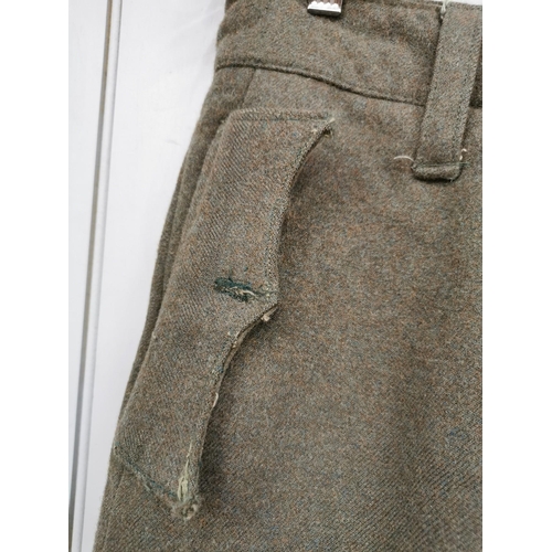 169 - A pair of tan-coloured WWII Royal Marines combat trousers.