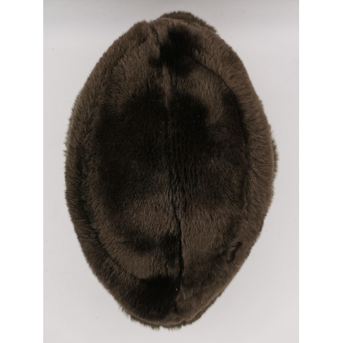 174 - A likely German, WWII Eastern front fur hat.