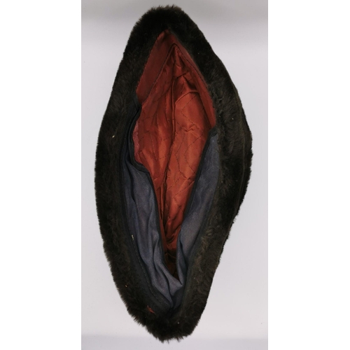 174 - A likely German, WWII Eastern front fur hat.