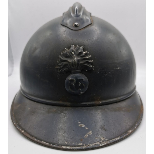 186 - A WWI French Infantry 'Adrian' helmet. An original, black helmet, stamped '58'. Complete with inner.