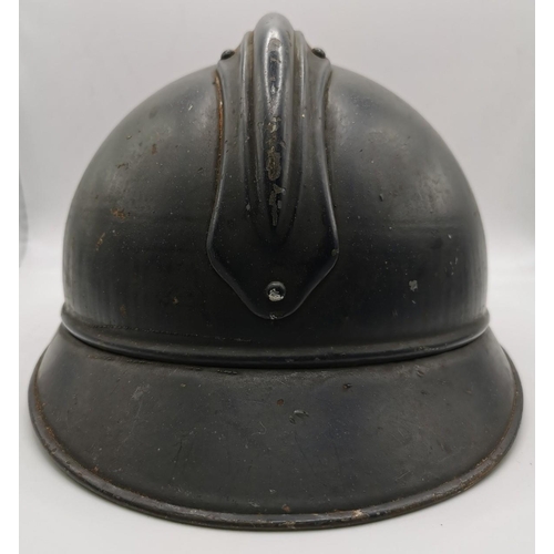 186 - A WWI French Infantry 'Adrian' helmet. An original, black helmet, stamped '58'. Complete with inner.