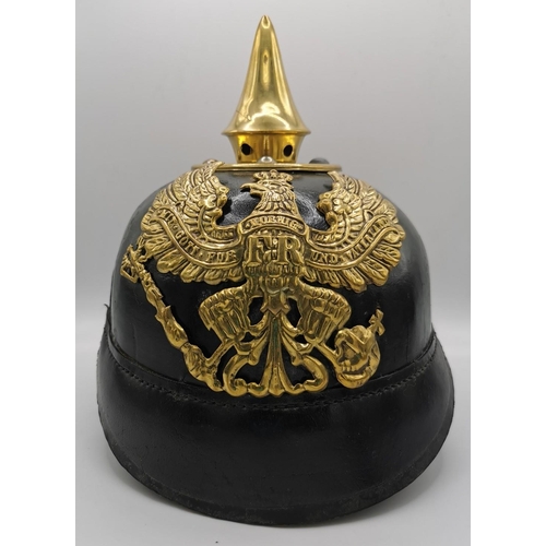 A WWI Imperial German Prussian Pickelhaube. Leather & Brass mounted.